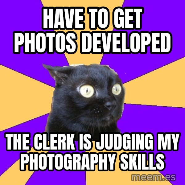 Anxiety Cat meme: have to get photos developed / the clerk is judging my photography skills